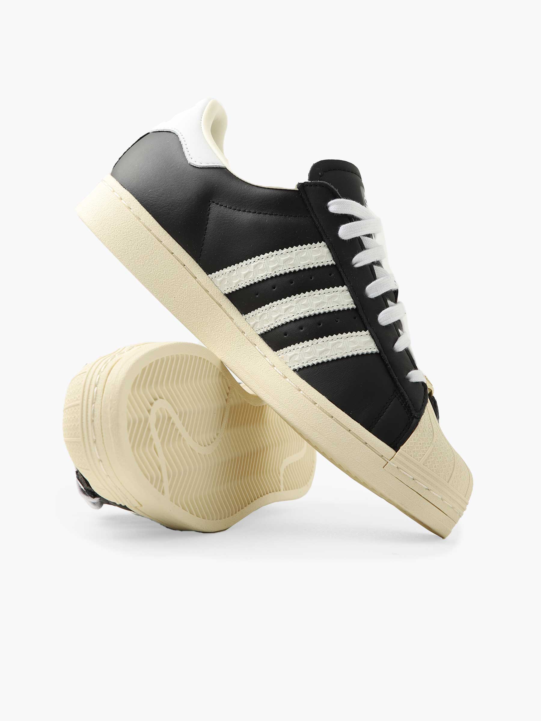 Adidas superstar black on sale and white